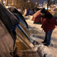 Someone with the Salvation Army going tent by tent to inform people of their options.